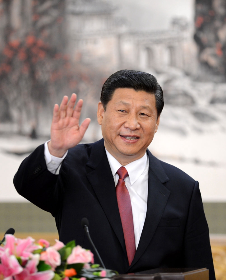 2012年11月15日，剛剛在中共十八屆一中全會上當(dāng)選中共中央總書記的習(xí)近平在北京人民大會堂同采訪十八大的中外記者親切見面。新華社記者 謝環(huán)馳 攝