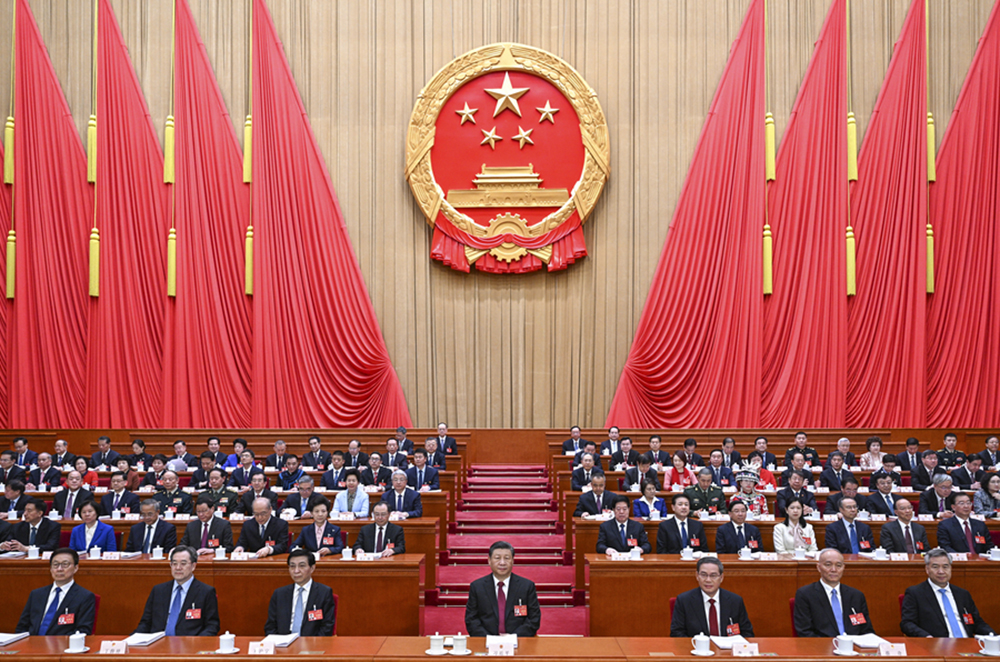 3月5日，第十四屆全國人民代表大會第二次會議在北京人民大會堂開幕。黨和國家領(lǐng)導(dǎo)人習(xí)近平、李強、王滬寧、蔡奇、丁薛祥、李希、韓正等出席大會。新華社記者 李學(xué)仁 攝