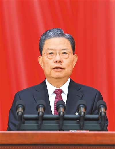 3月8日，十四屆全國人大二次會議在北京人民大會堂舉行第二次全體會議。受全國人大常委會委托，趙樂際委員長向大會報告全國人大常委會工作。 　　新華社記者 王 曄攝