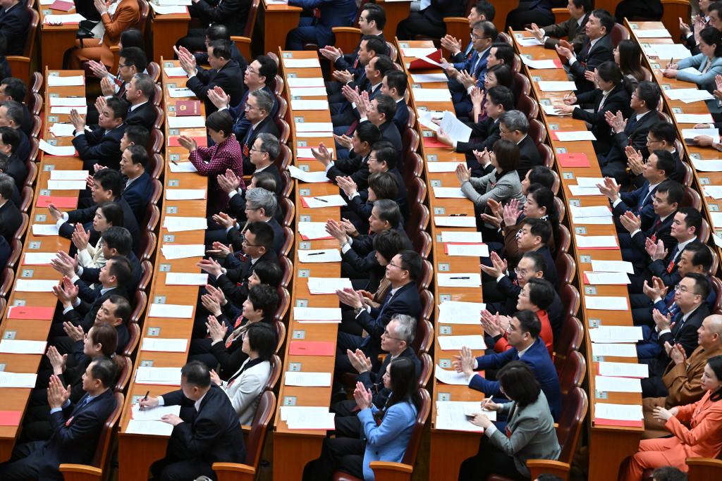 3月11日，第十四屆全國人民代表大會第二次會議在北京人民大會堂舉行閉幕會。新華社記者 李鑫 攝