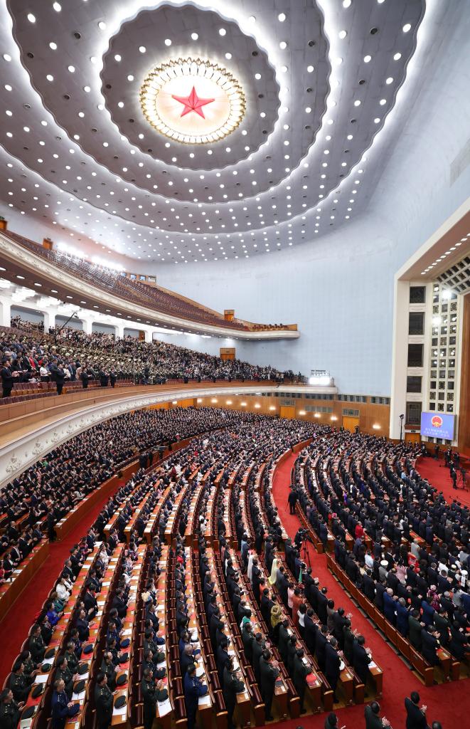 3月11日，第十四屆全國人民代表大會第二次會議在北京人民大會堂舉行閉幕會。新華社記者 丁林 攝