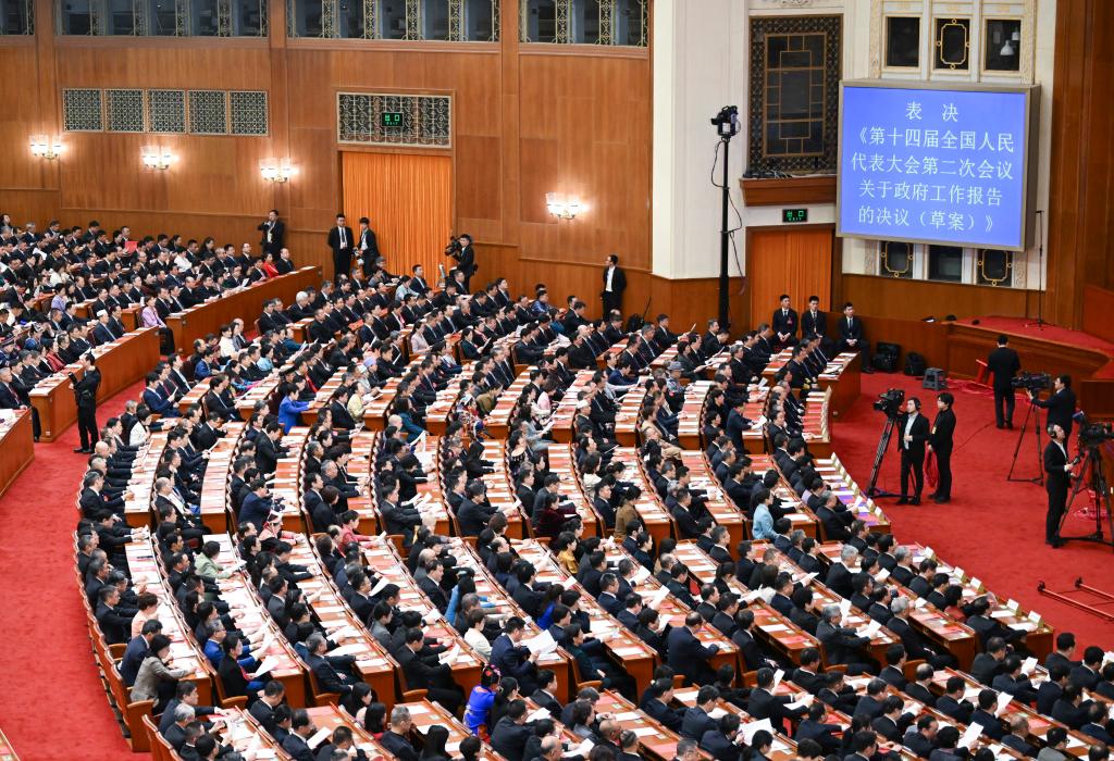 3月11日，第十四屆全國人民代表大會第二次會議在北京人民大會堂舉行閉幕會。新華社記者 牟宇 攝